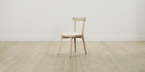 The Allen  - Pebbled Leather Swan Dining Chair