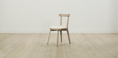 The Allen  - Pebbled Leather Swan Dining Chair